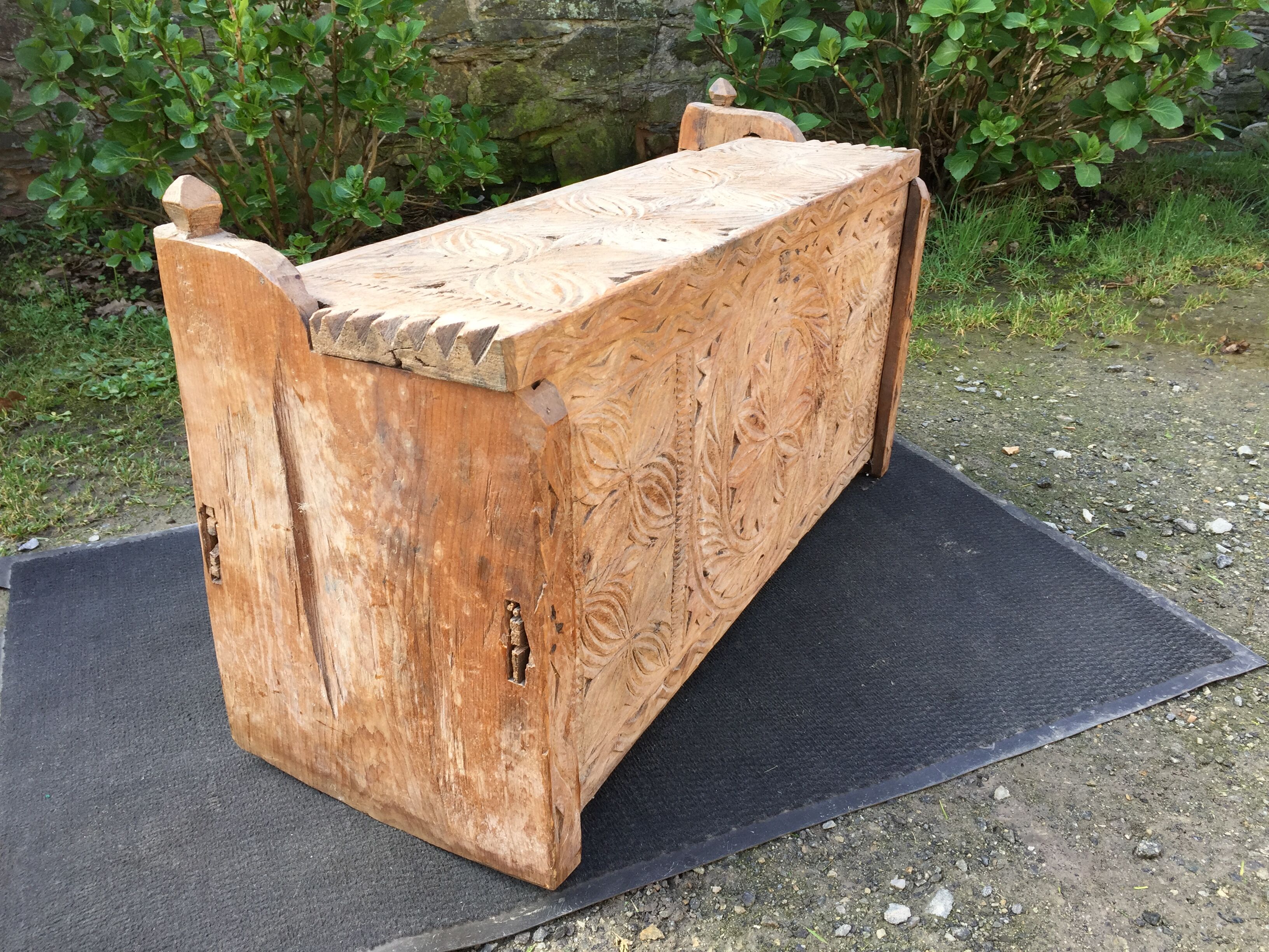Ancient brutalist chest carved wind rose