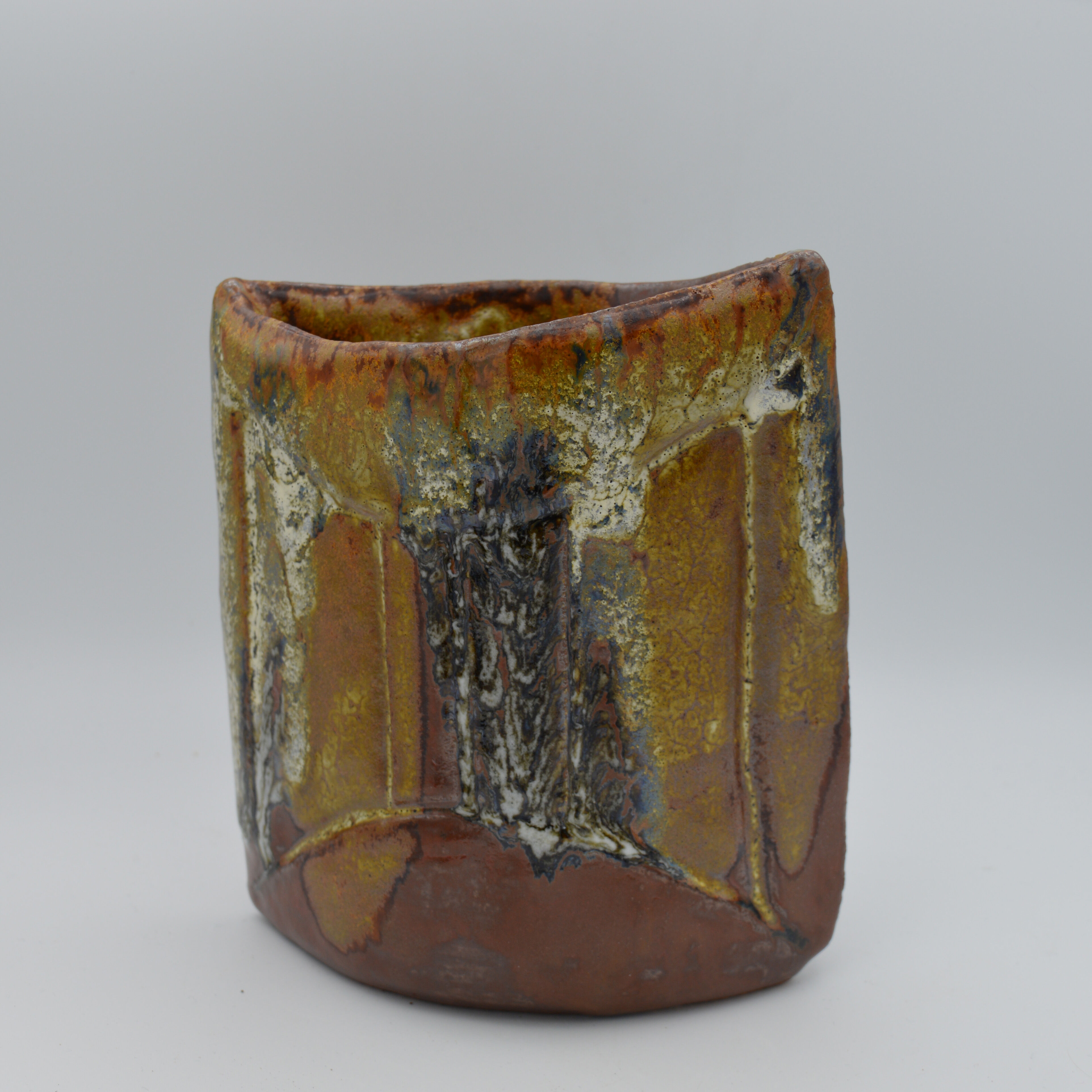 Enamelled sandstone vase