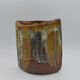 Enamelled sandstone vase
