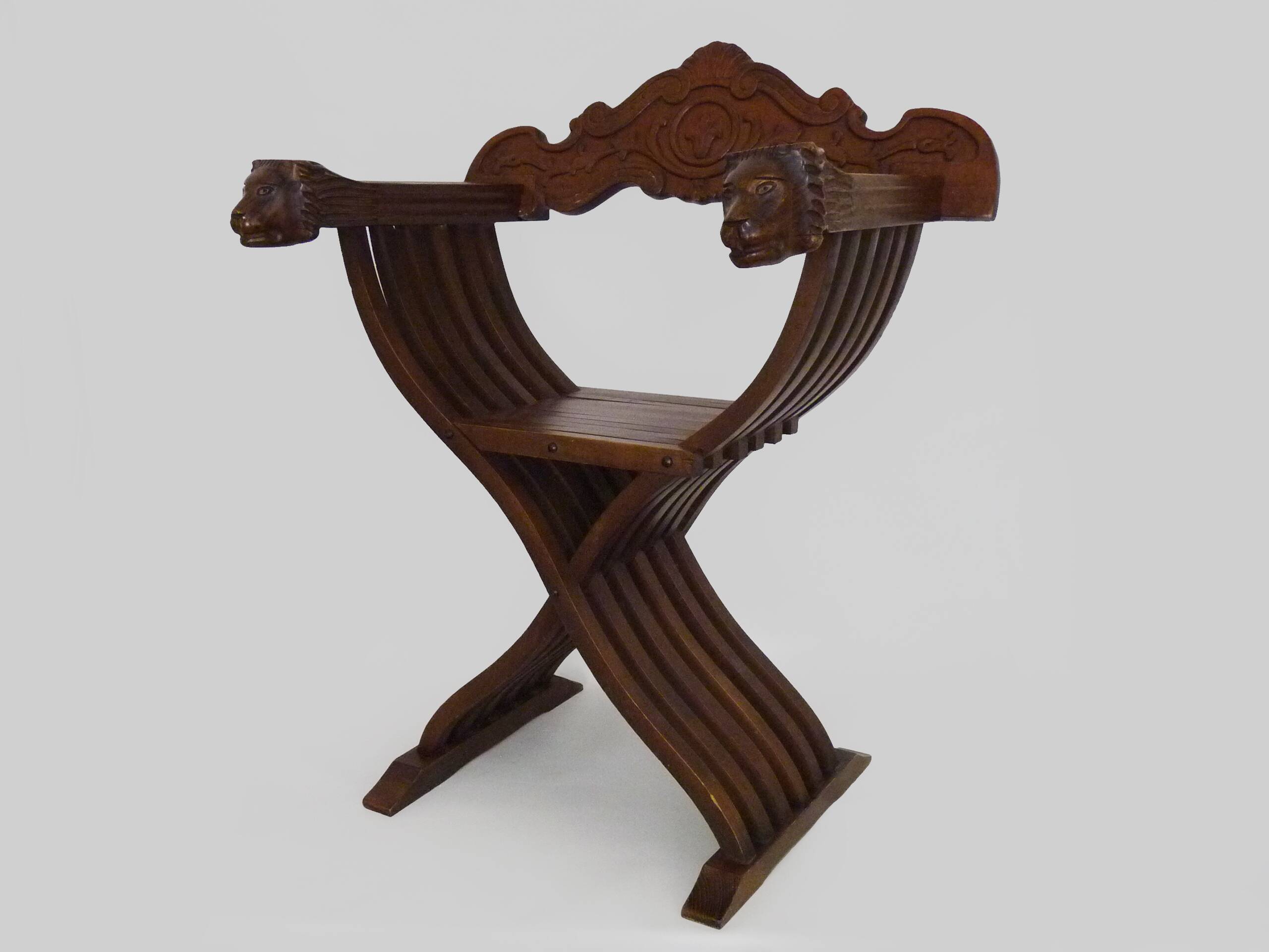 Vintage Savonarola chair with lion head, wood, Italy, 1950s