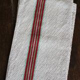 Old chevron towel with red and green stripes.