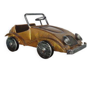 Vintage metal car in industrial style