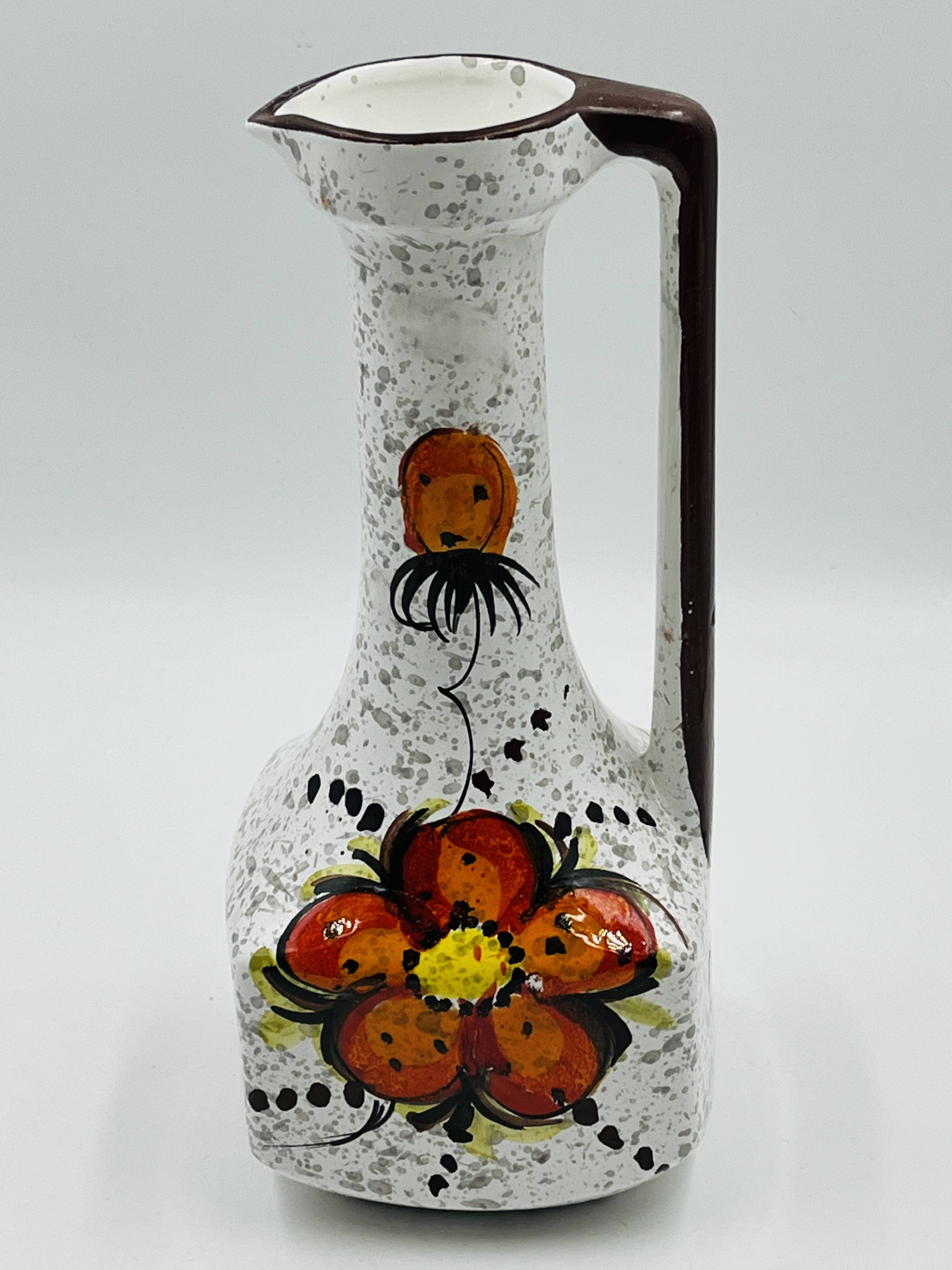 Vintage Italian vase in the shape of a carafe with floral decoration from the 1970s.