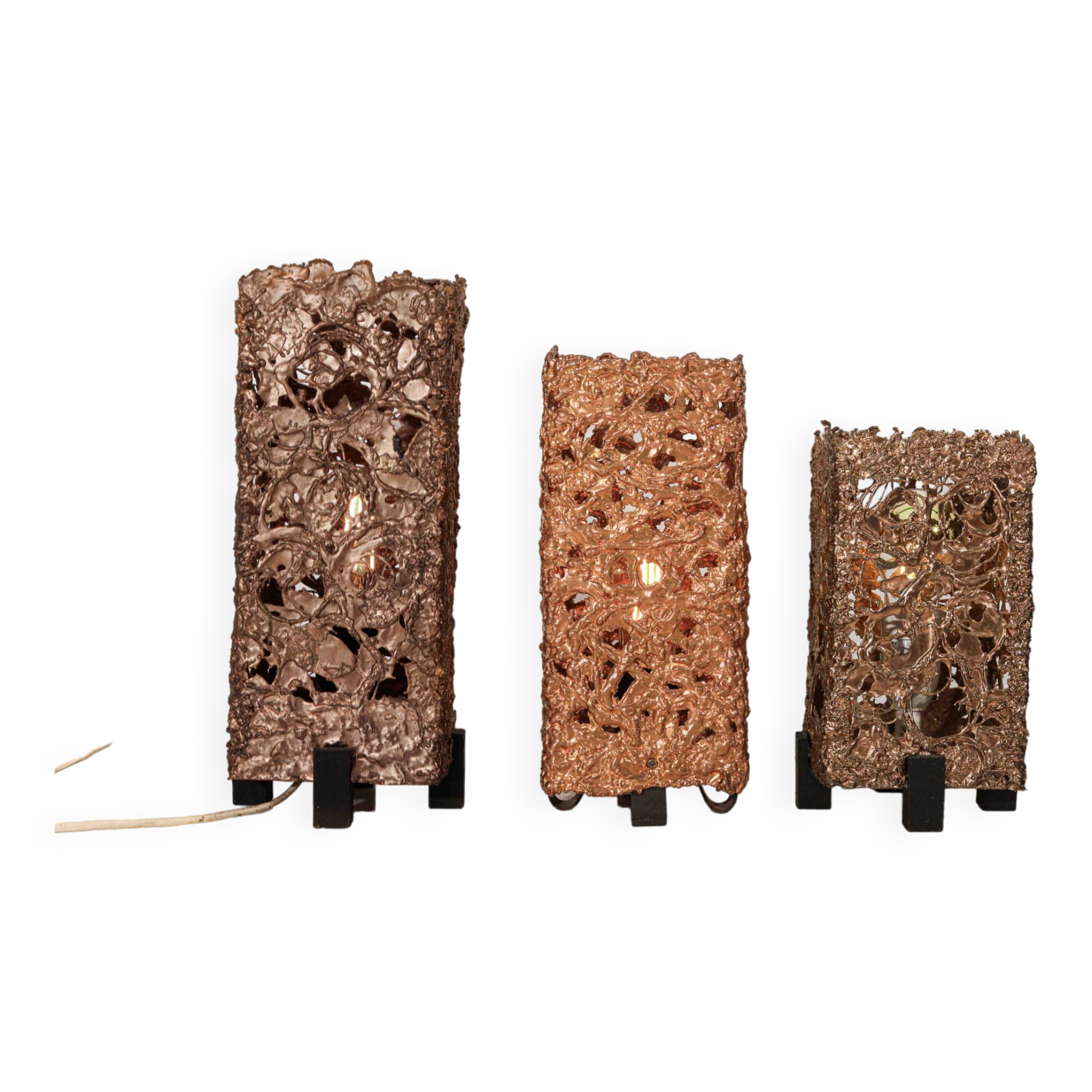 Set of 3 Finnish Aimo Tukiainen lamps in cast copper, 1960s."