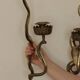 Pair of Egyptian Revival Style Engraved Brass Cobra Sconces