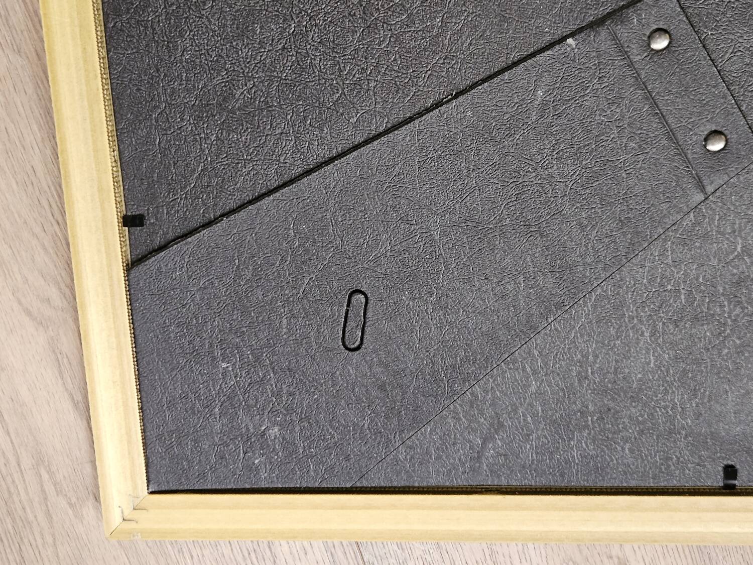 Golden wooden frame with floral patterns