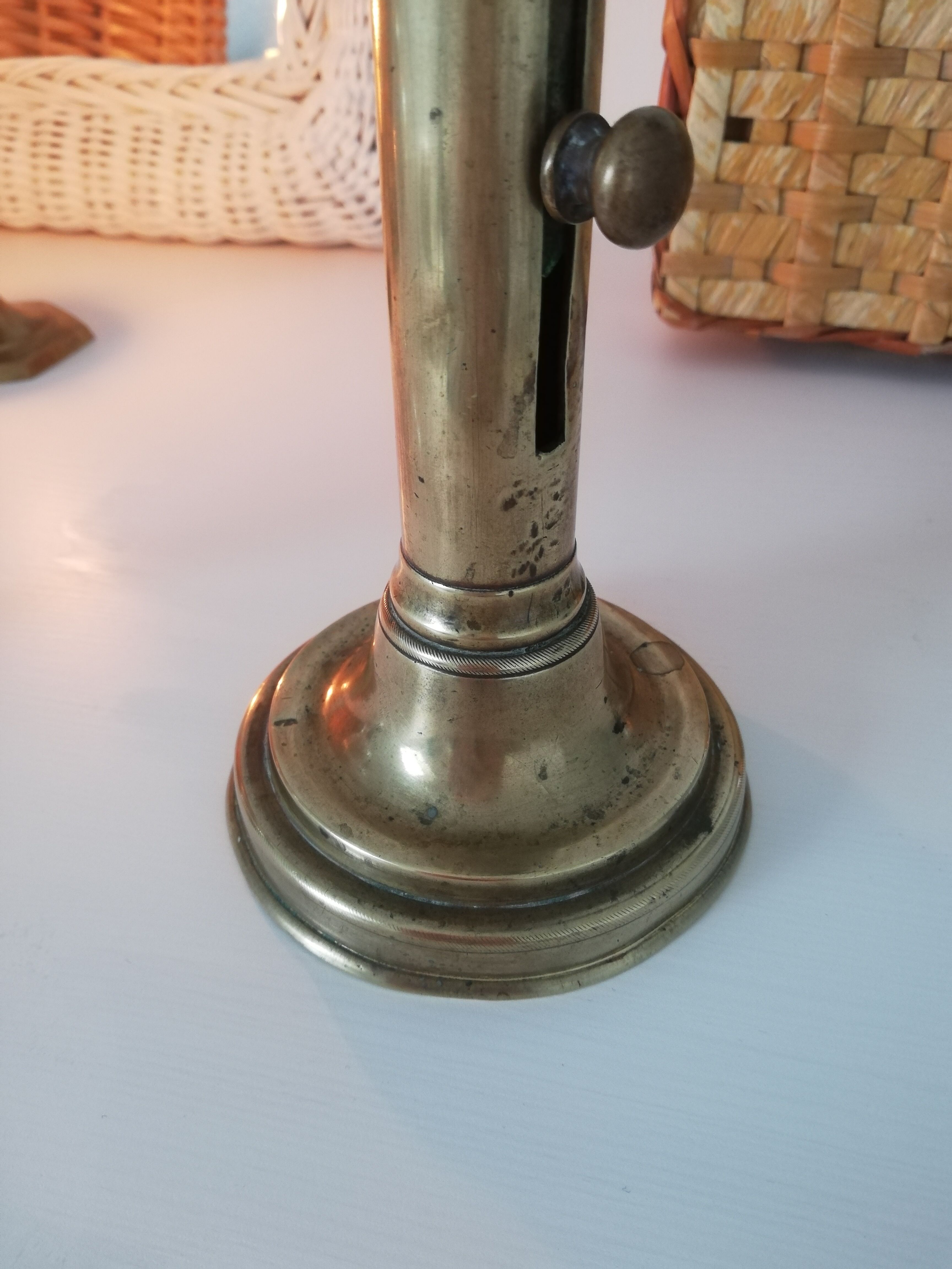 Vintage push candle holder