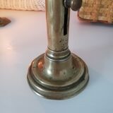 Vintage push candle holder
