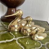 Three brass ducks from the 1950s