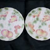 Two slip plates decorated with fruit.