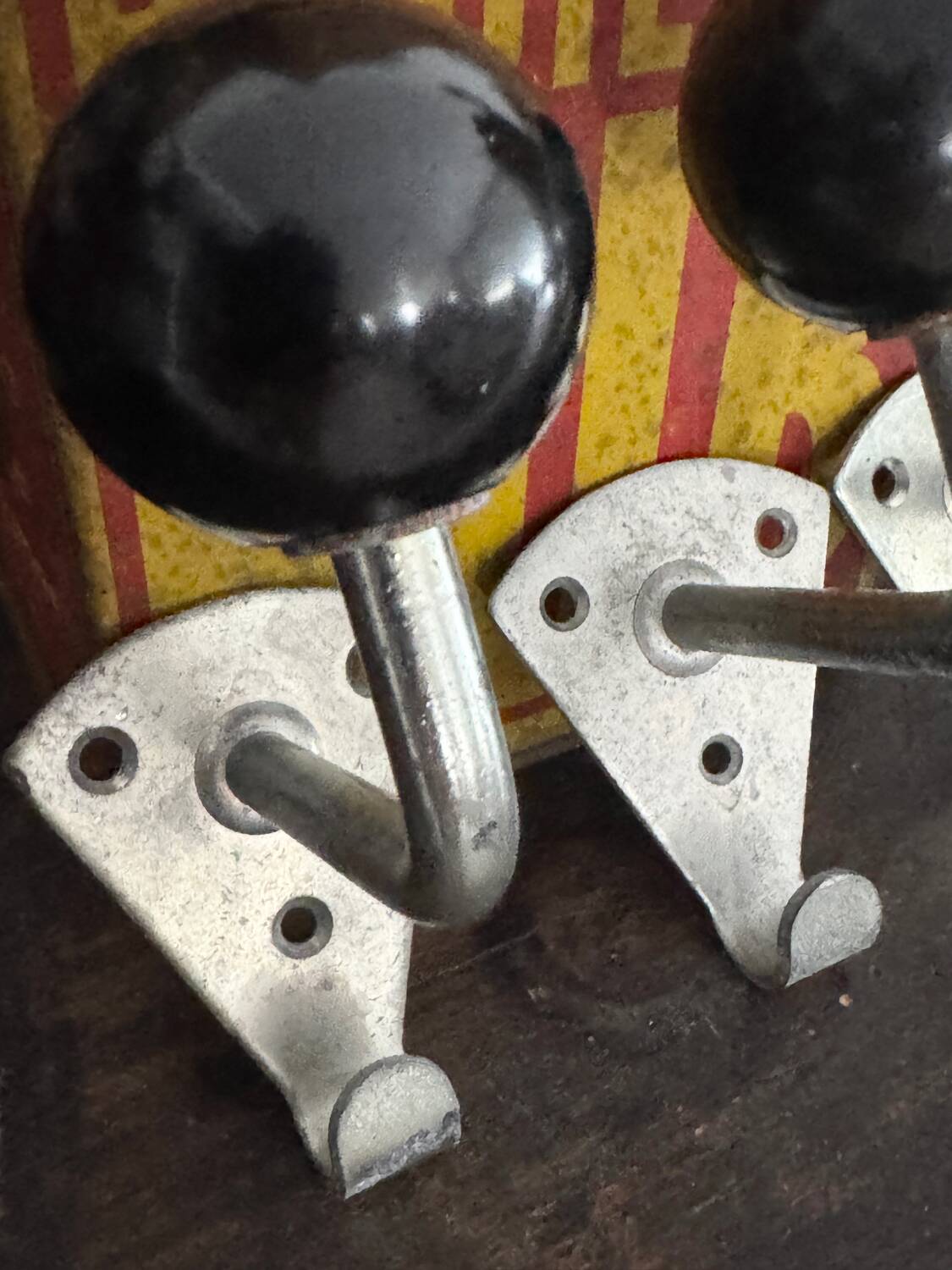 Old vintage black Bakelite ball hooks