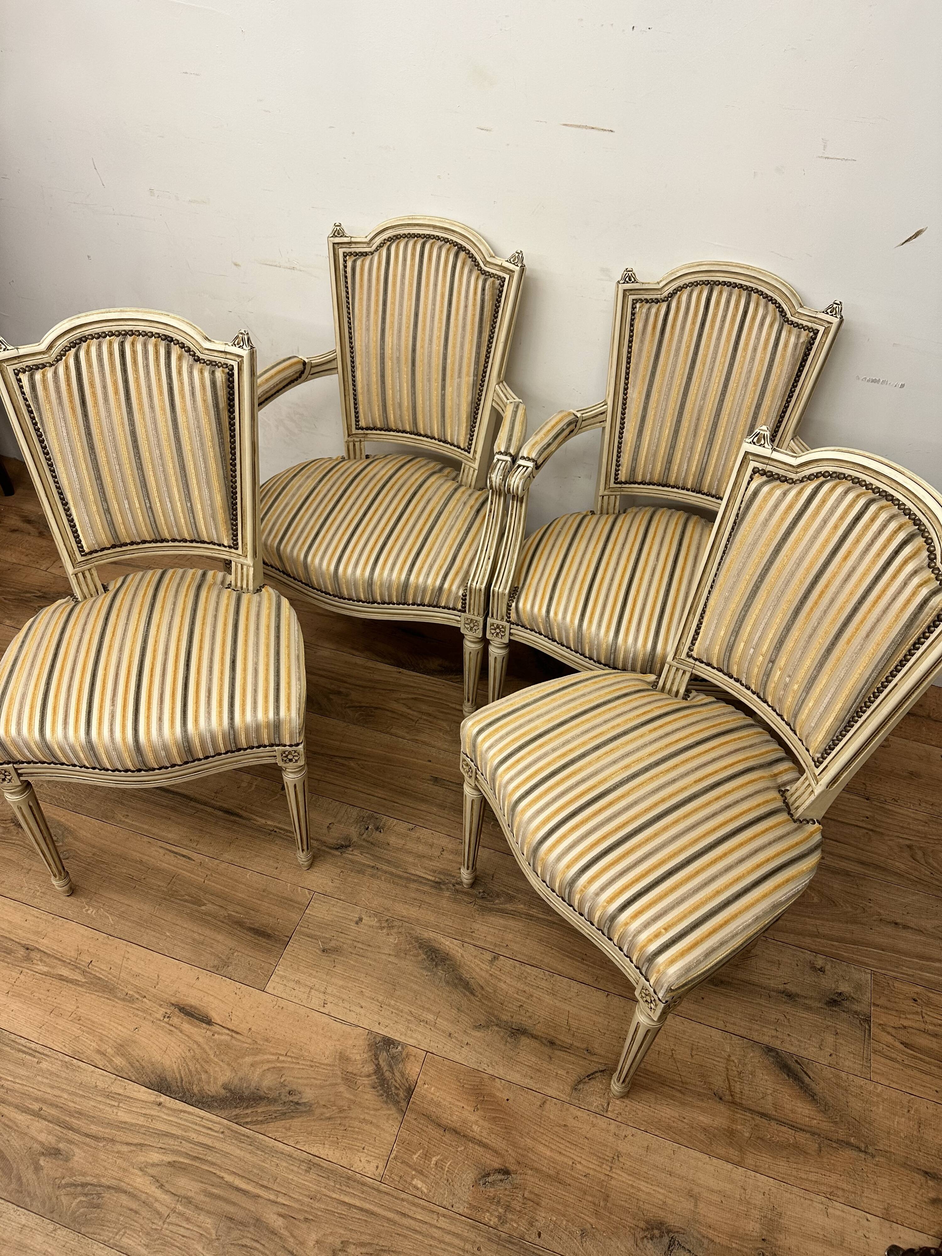 2 convertible armchairs and 2 Louis XVI style chairs