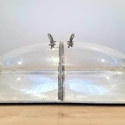 Large serving platter with lid, in silver metal.