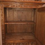 Antique carved oak wardrobe – figurative scene – late 19th century