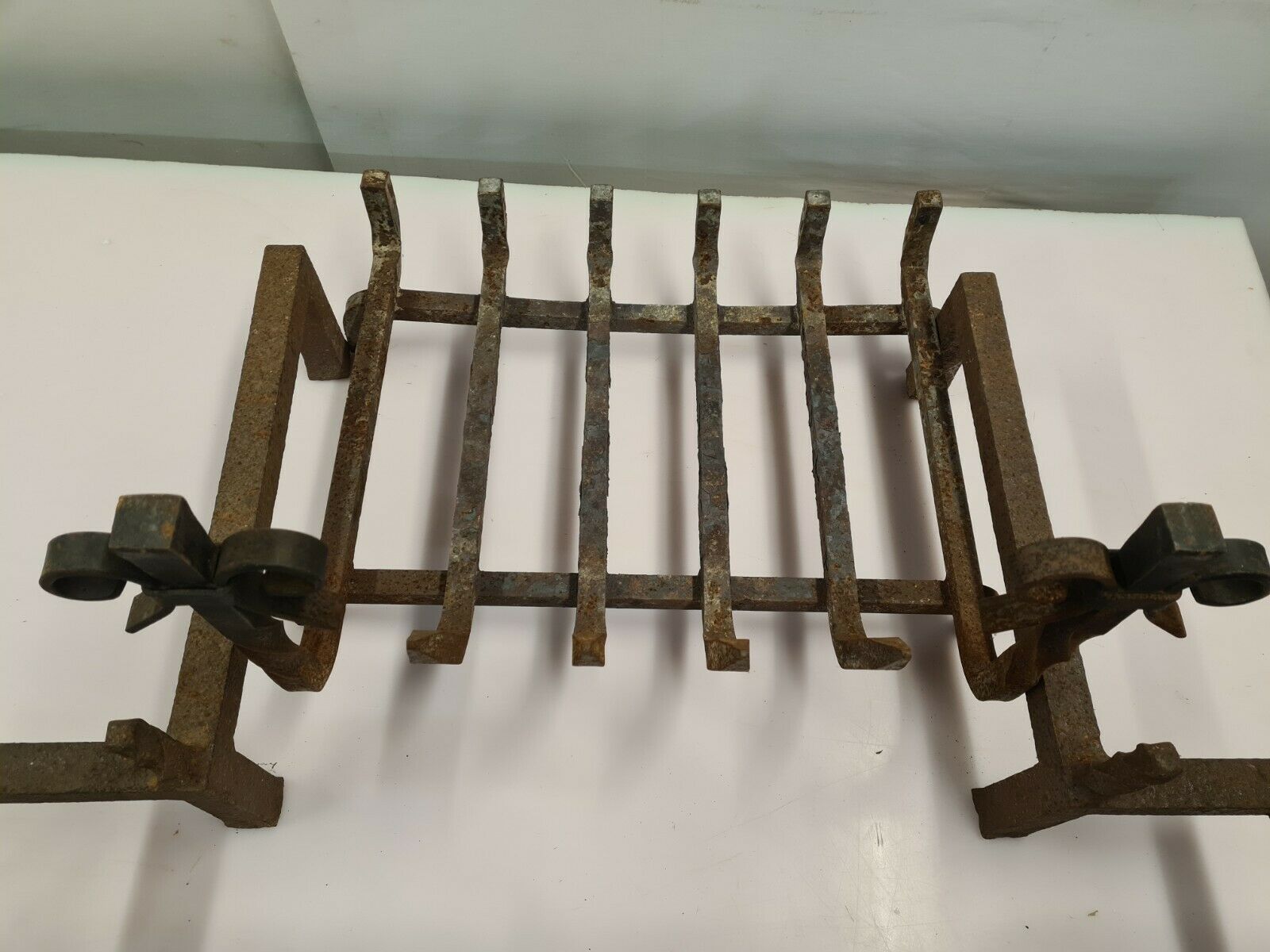 Pair of cast iron andirons for the fireplace