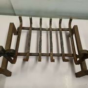 Paire de chenets / landiers en fonte pour la cheminée