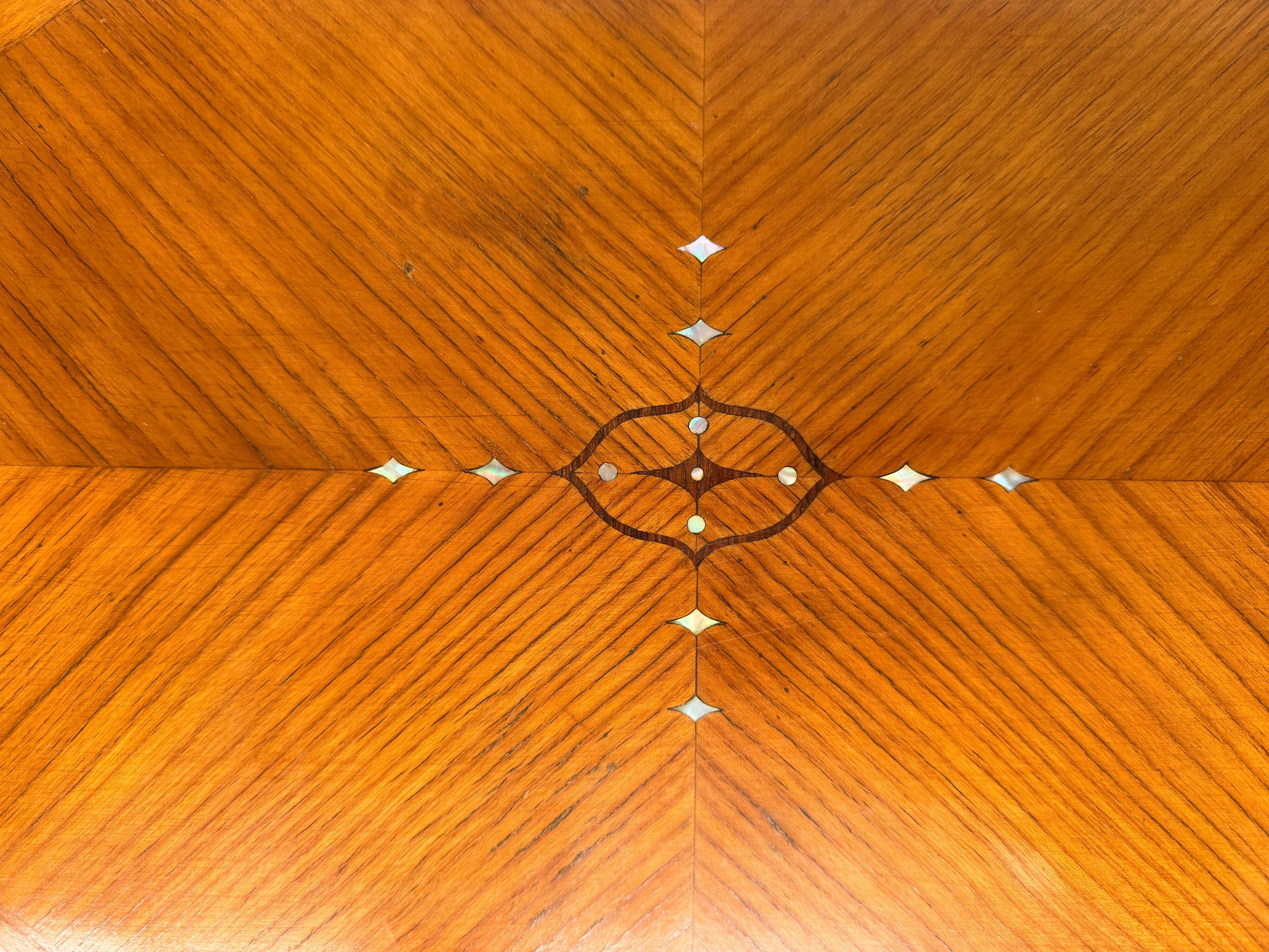 Oval side table in the style of Kolo Moser