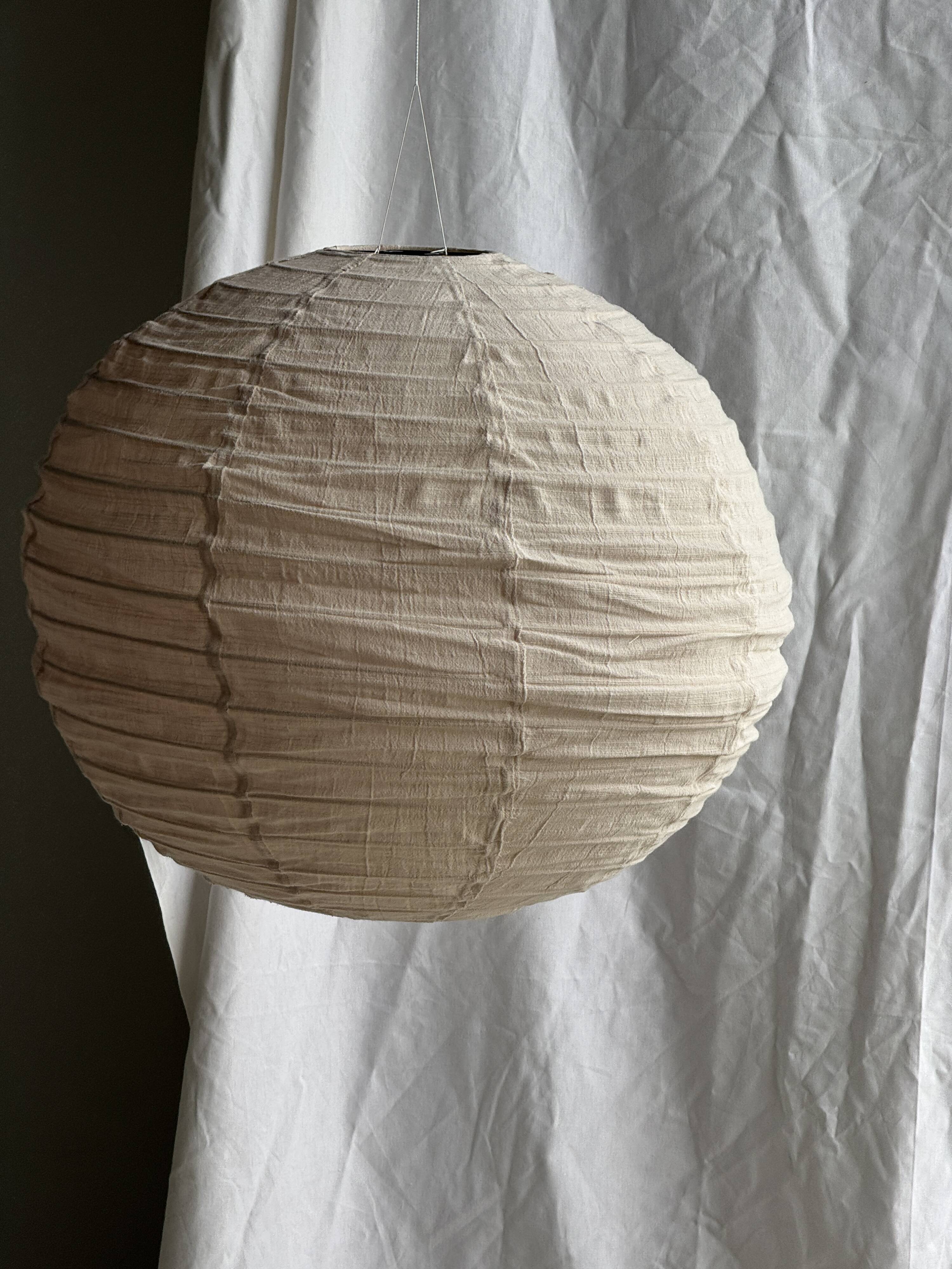 Large round pink Japanese-style suspension made of rattan and natural linen D60.