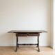 Napoleon III side table or desk in wood and green leather.