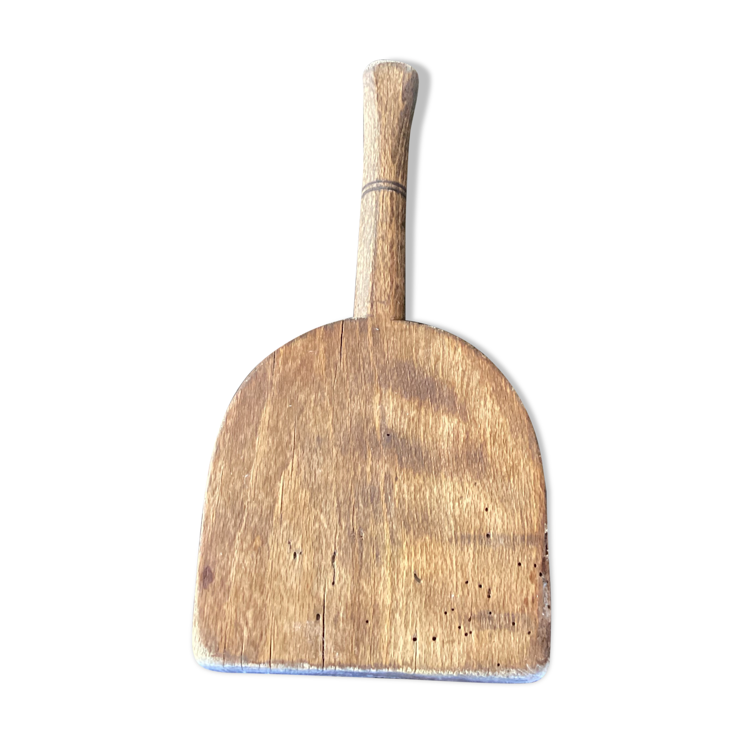 Old wooden clothes beater