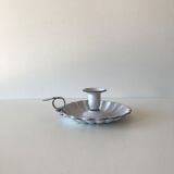 Candlestick in white enameled metal