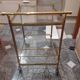 Brass and glass serving trolley