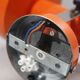 Vintage adjustable spot lamp, orange aluminium design from the 1970s.