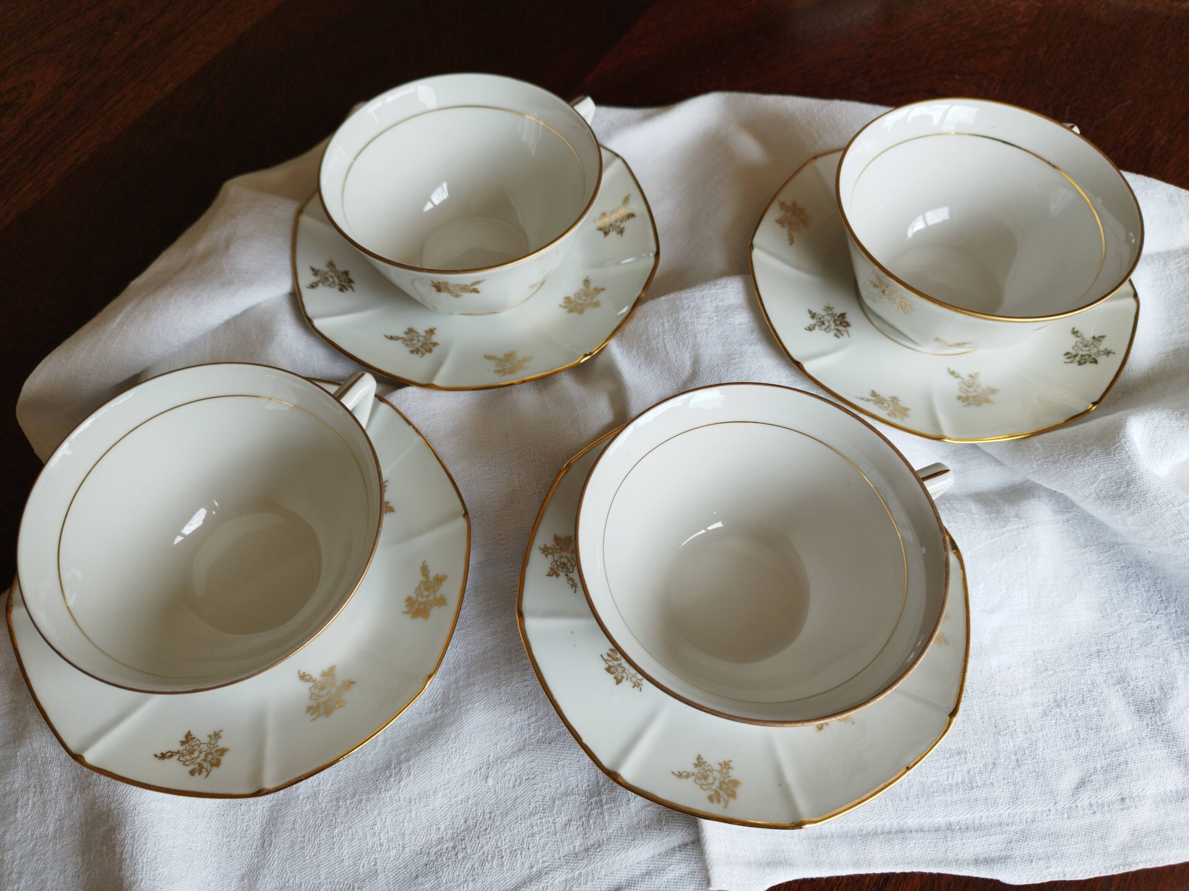 Set of 4 white porcelain cups