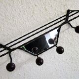 Wrought iron wall rack
