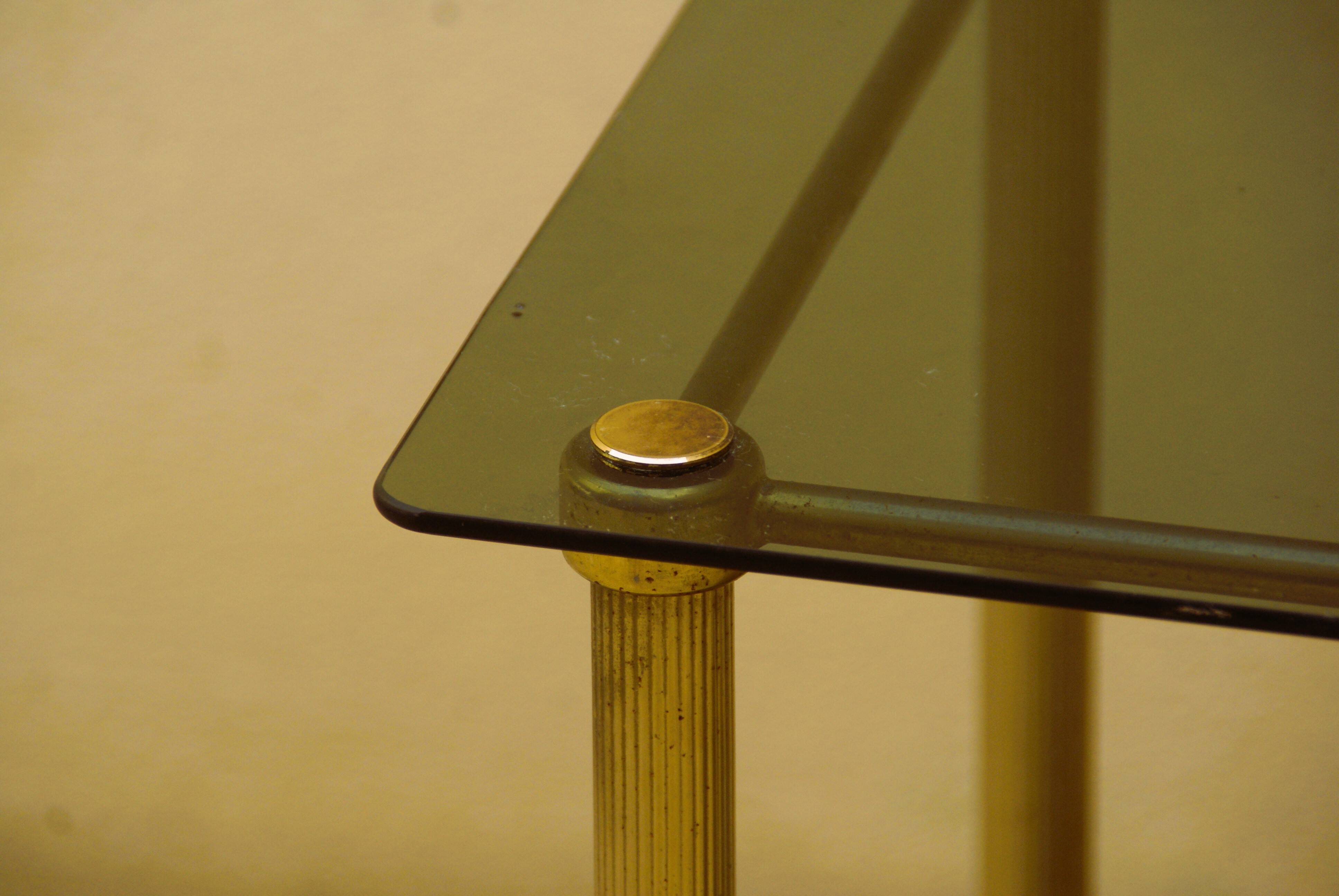 Antique brass serving trolley with smoked glass top, Louis XVI style.