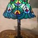 antique wrought iron floor lamp, 1900 to 1940 with stained glass lampshade