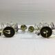 Paire de lampes girandoles en bronze et cristal