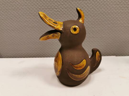 Old ceramic piggy bank. shaped like a duck from hegnetslund denmark
