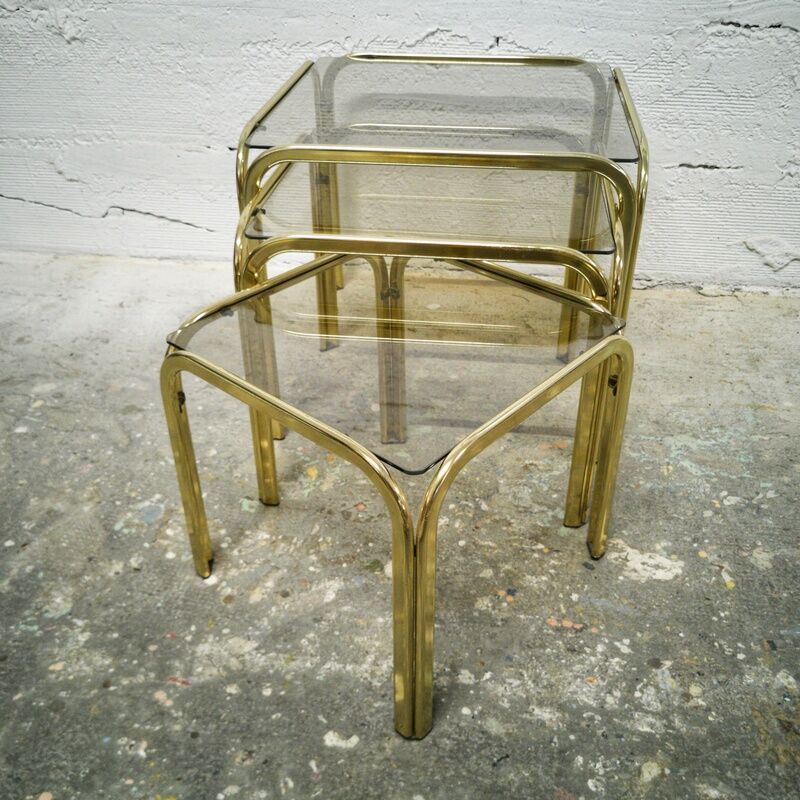 Trio of gilded metal trundle tables