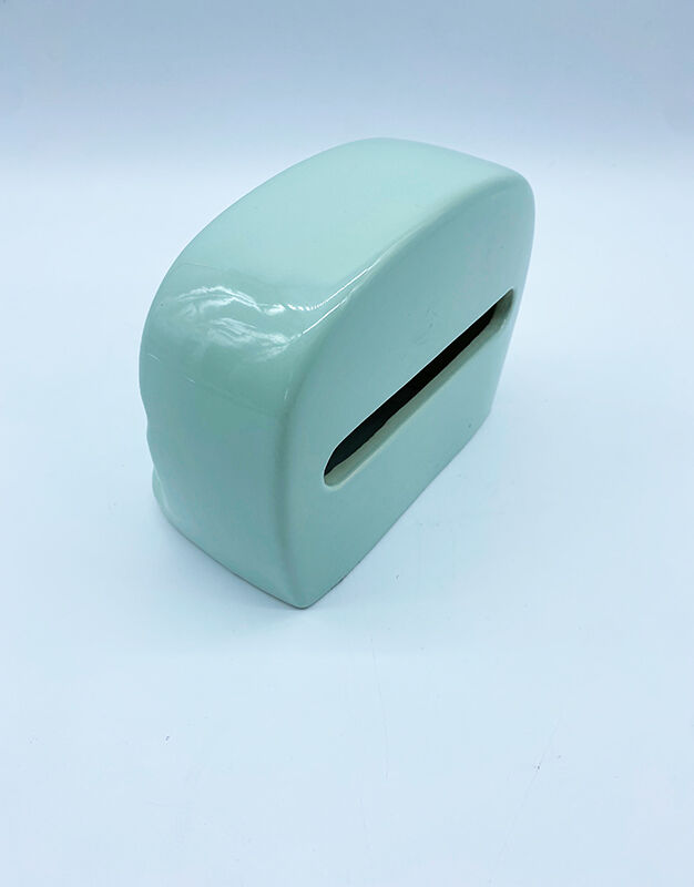 Wall-mounted ashtray and toilet paper dispenser