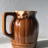 Small brown ceramic pitcher