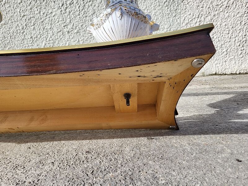 Italian coffee table with glass top, wooden base, and porcelain legs