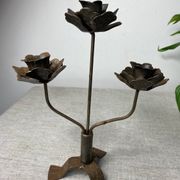 Rose shaped metal candle holder