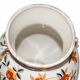 Art Deco round vase by Boch Frères Keramis, red flowers and blue bands.