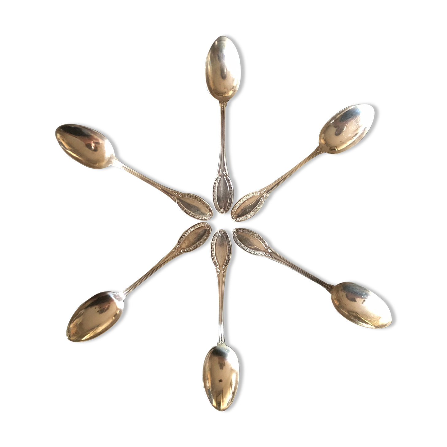 6 teaspoons in solid silver