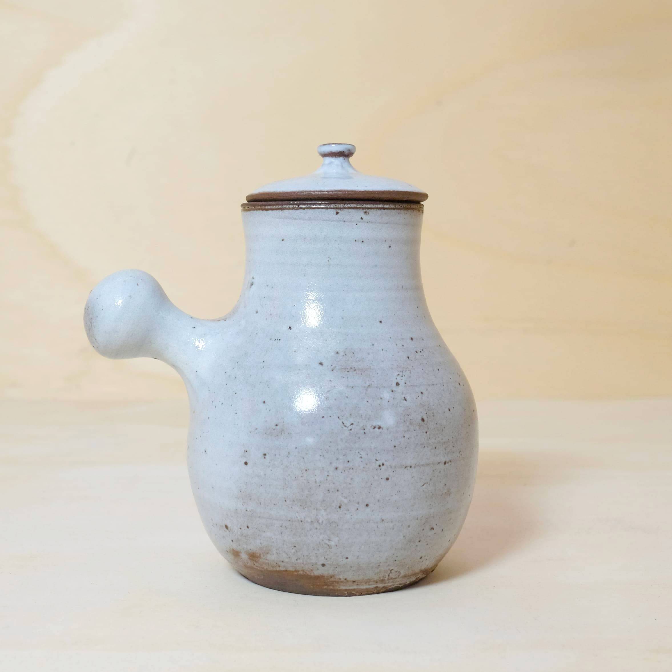 Jeanne and Norbert Pierlot, enamelled stoneware teapot and stopper, 26cm.