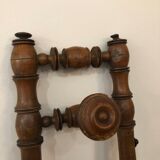 Wooden coat rack with swivel hooks
