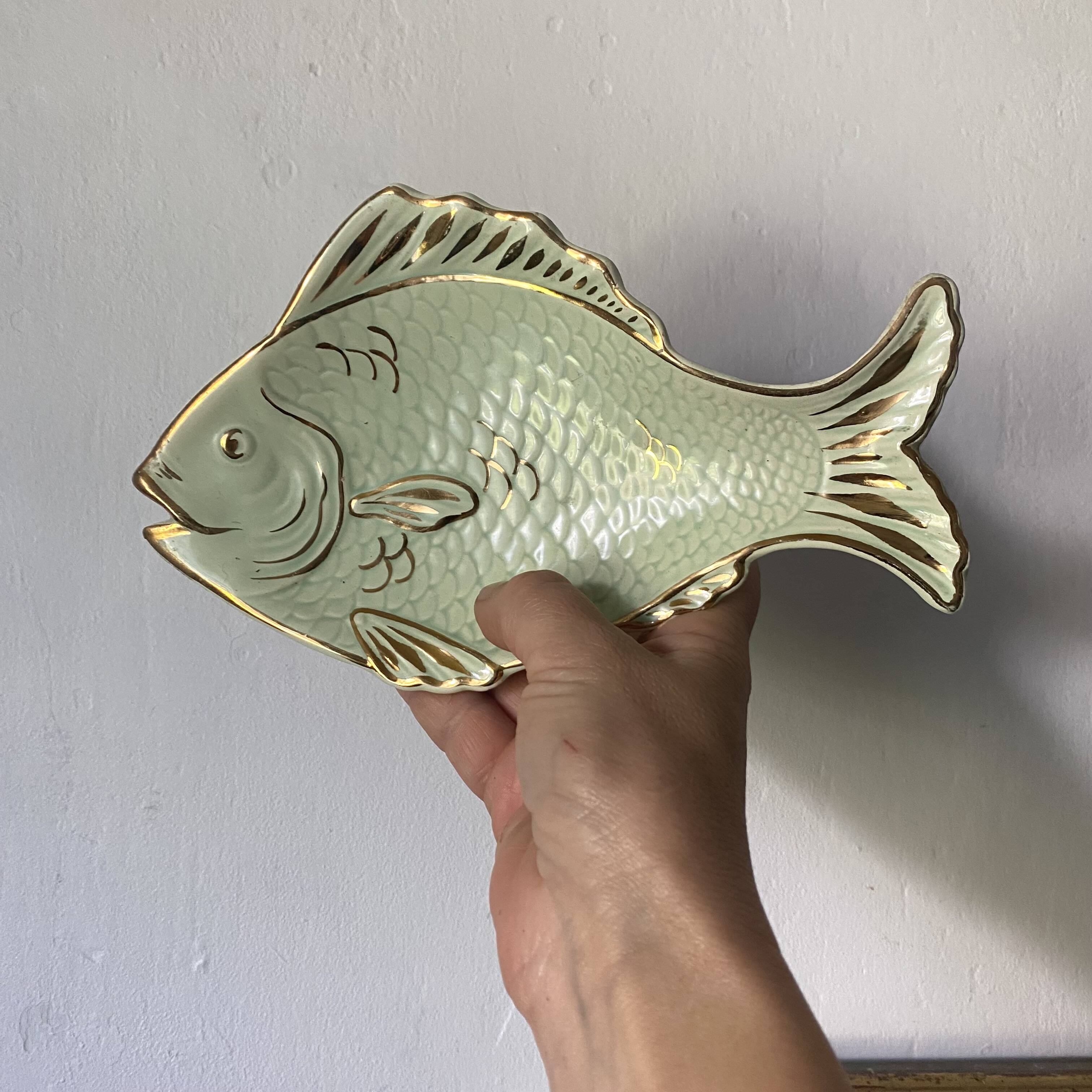 Small fish dish, pocket emptier.