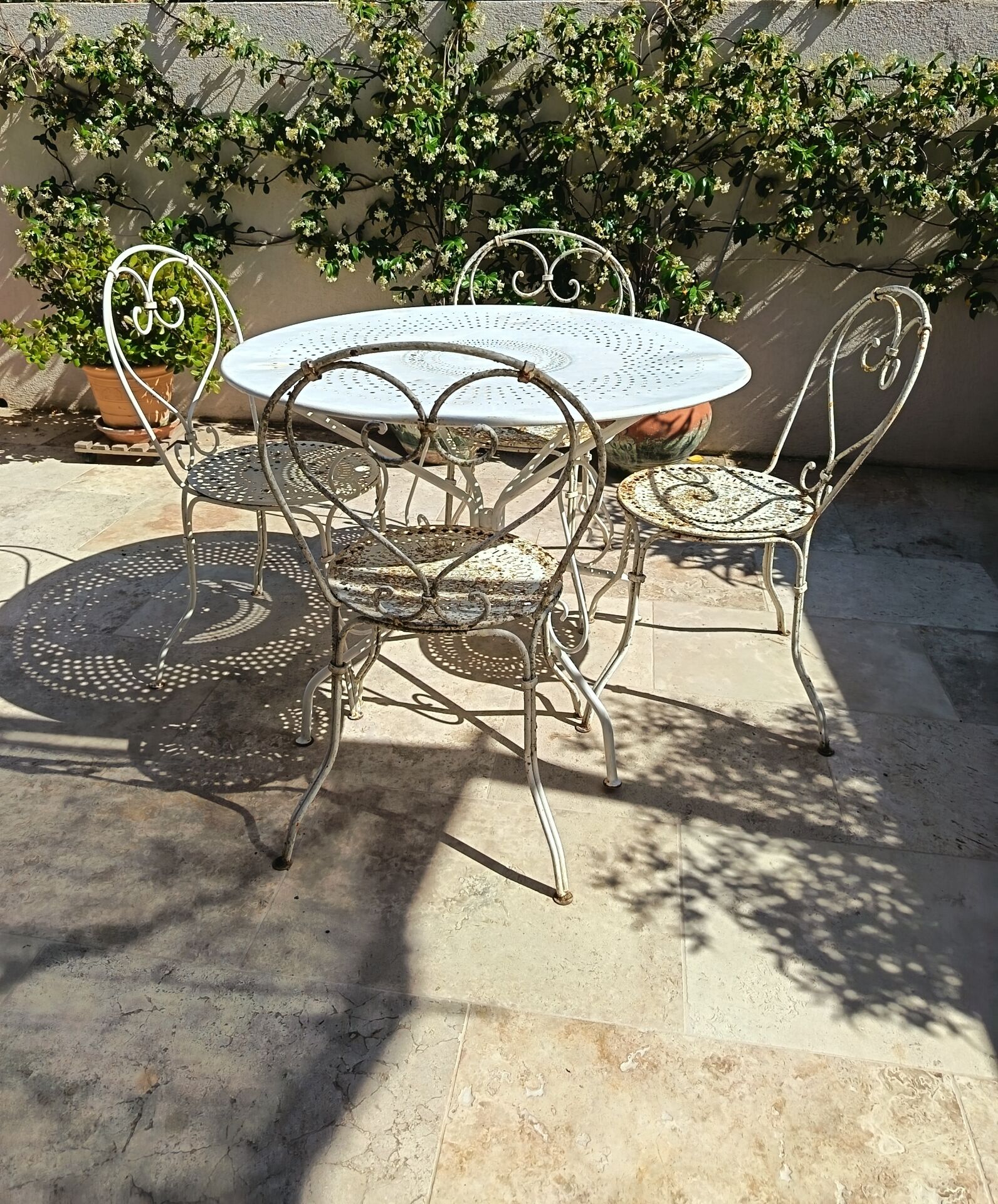 12 chaises Fermob 1900 et table Montmartre