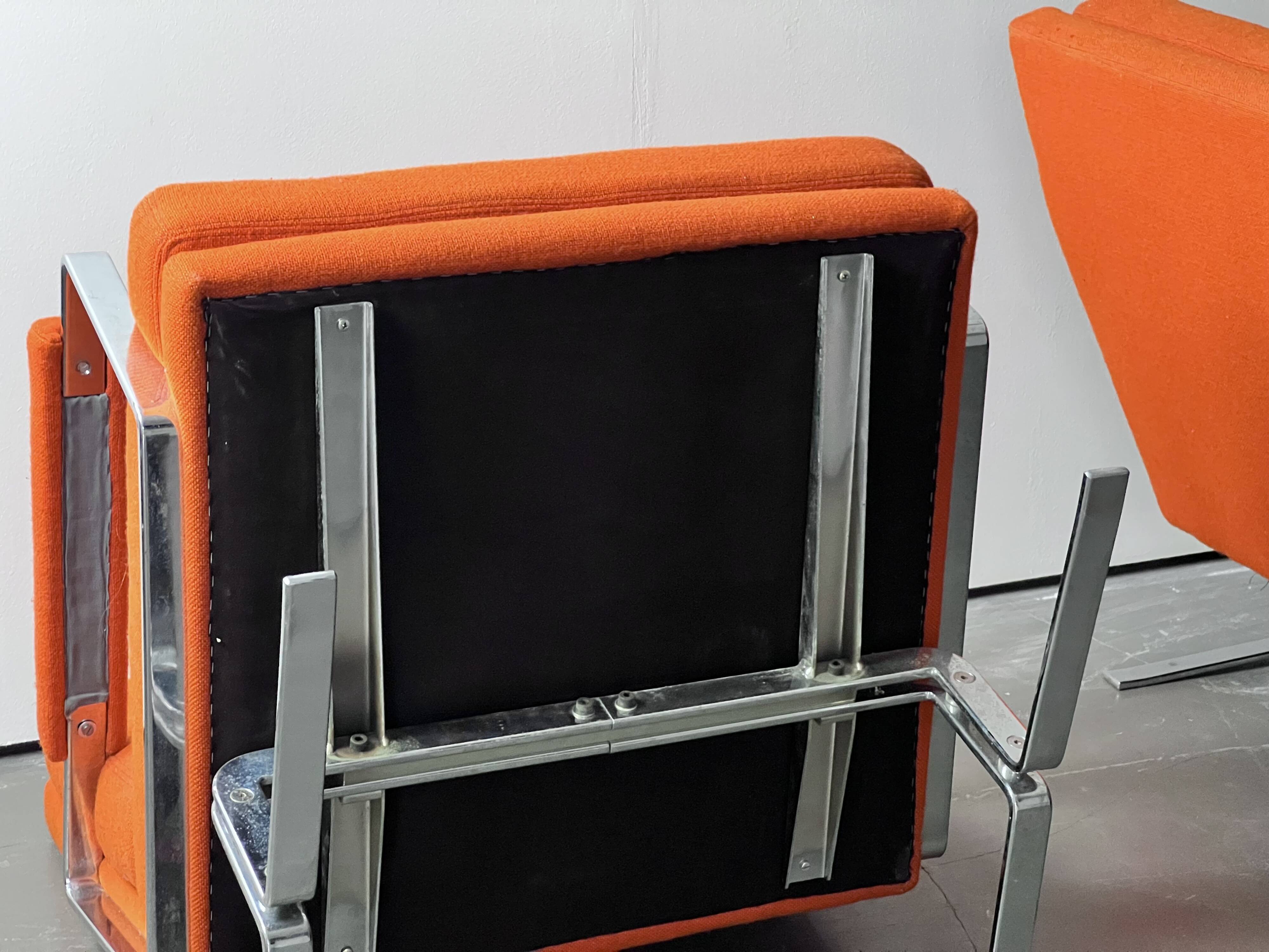 Pair of Karl Erik Ekselius armchair, in orange and chrome Kadrat fabric