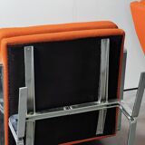 Pair of Karl Erik Ekselius armchair, in orange and chrome Kadrat fabric
