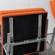 Pair of Karl Erik Ekselius armchair, in orange and chrome Kadrat fabric