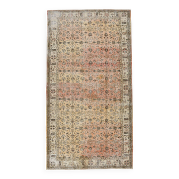 Tapis vintage à motifs tribaux géométriques