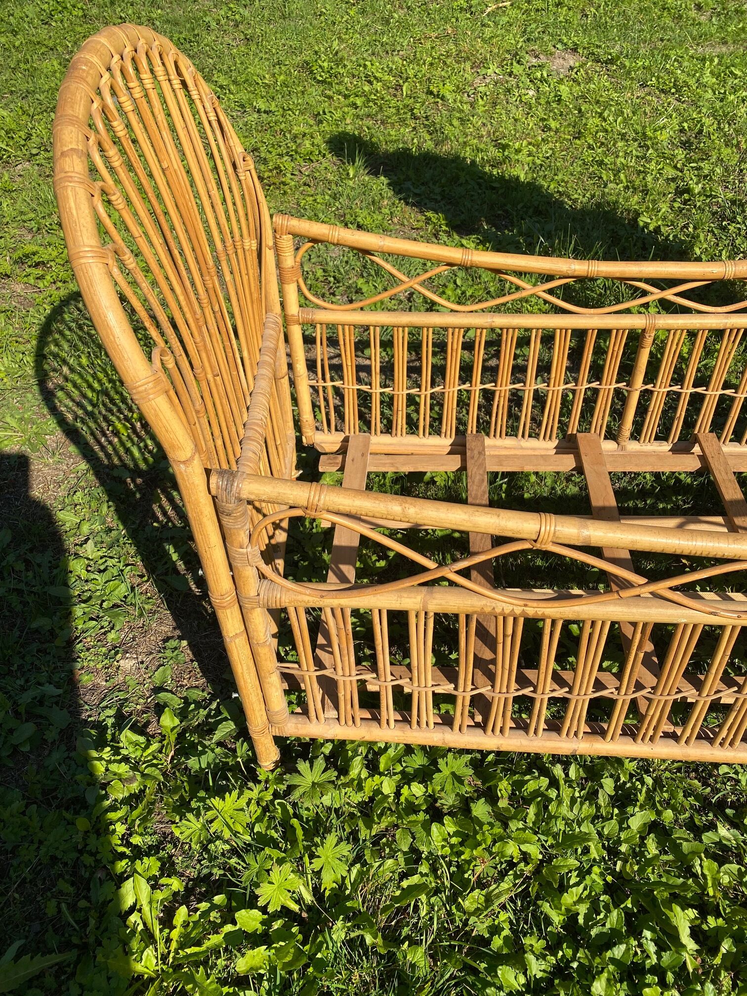 Children's bed in vintage rattan