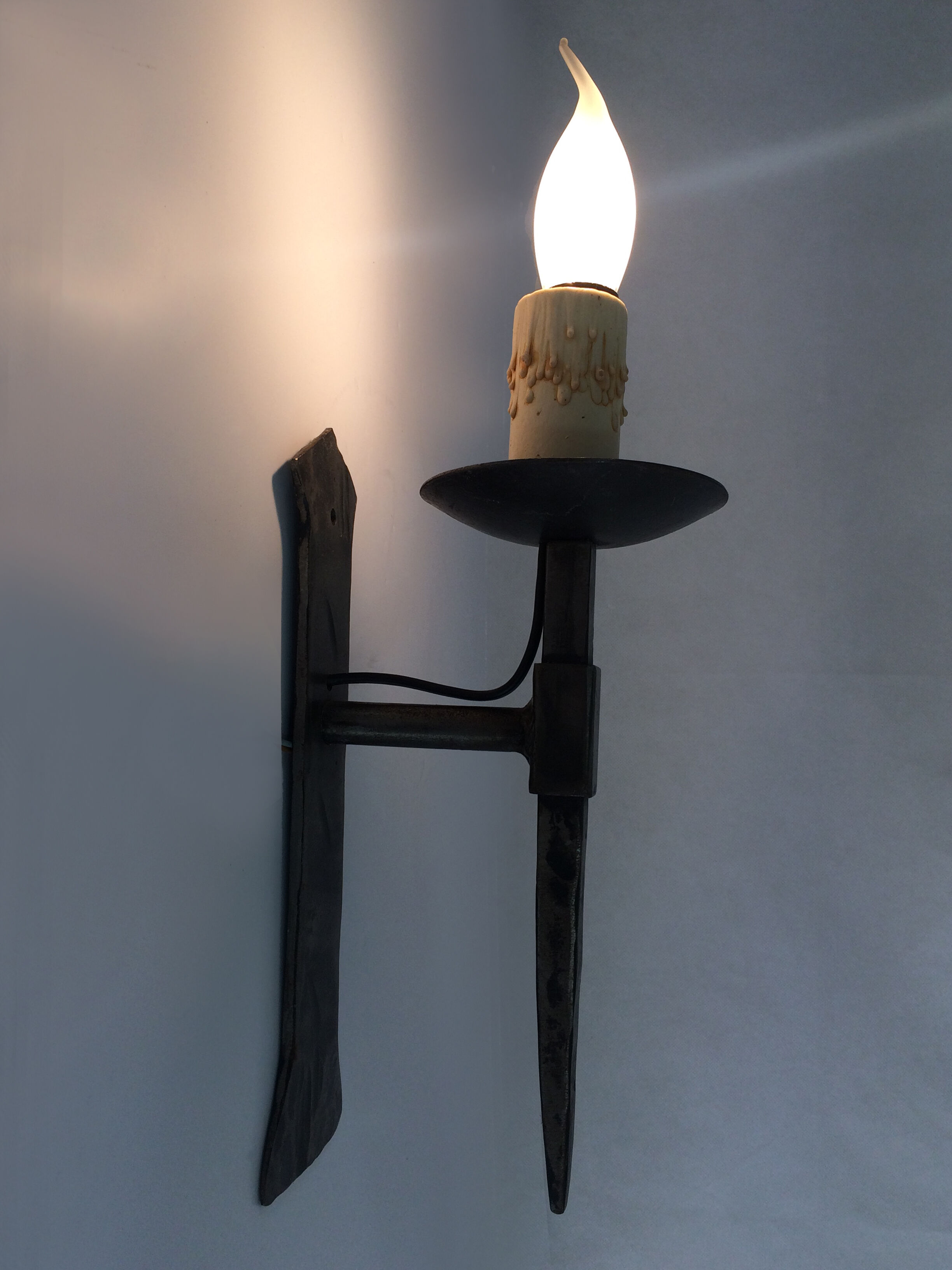 Old pair of wrought iron wall sconces. Castle sconces. Year 50 60